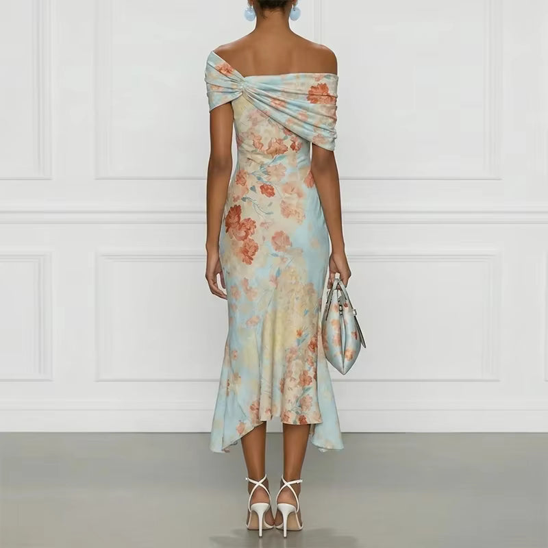 Robe Maison Lunéa midi fleurie épaules dénudées, ourlet asymétrique